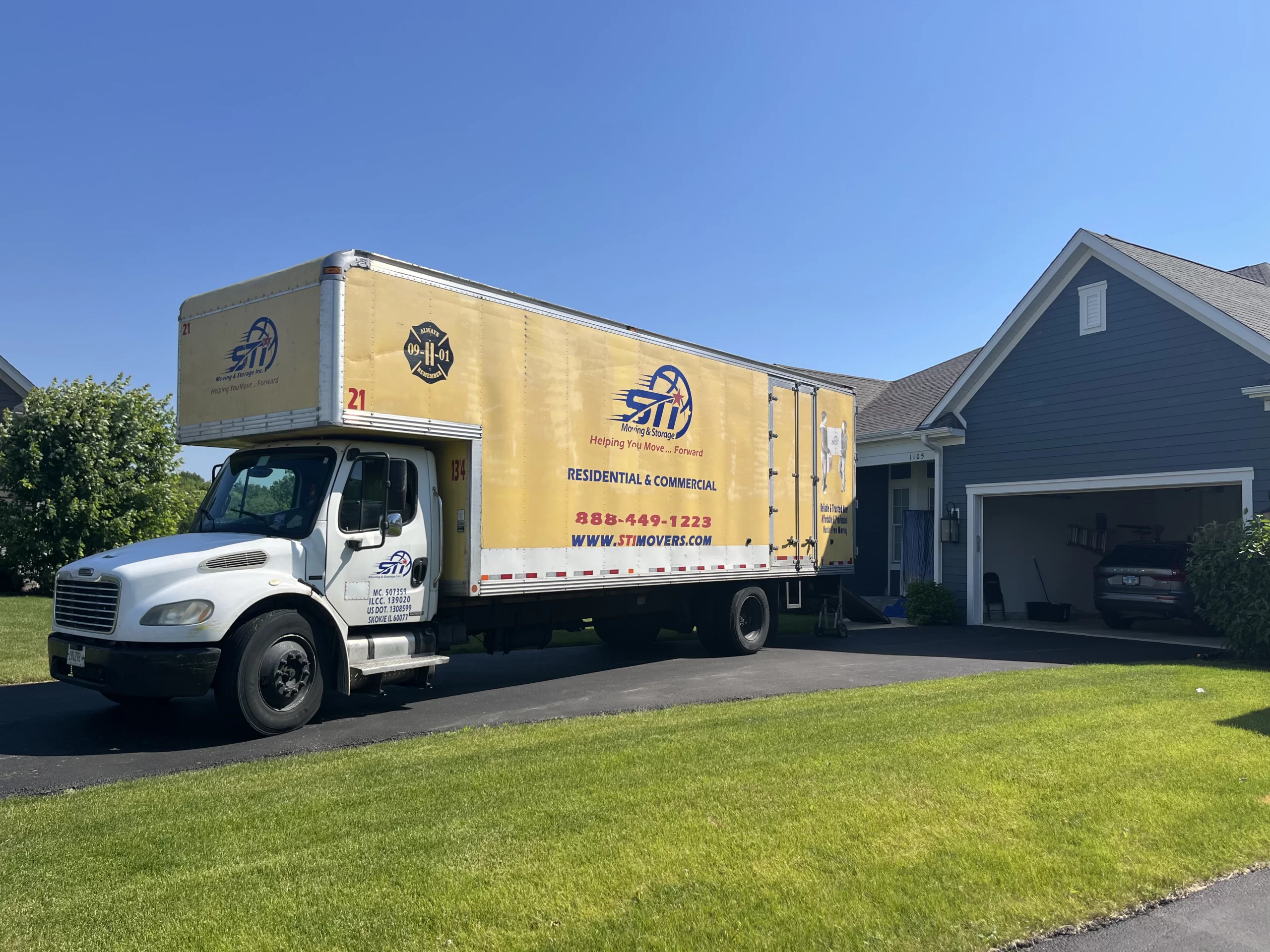Ingleside movers packing truck near Long Lake scaled